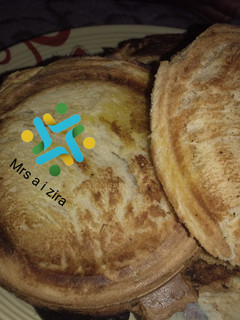A picture of Toasted bread using manual toaster.