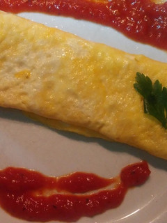 Una foto de Rulo de bacon y queso