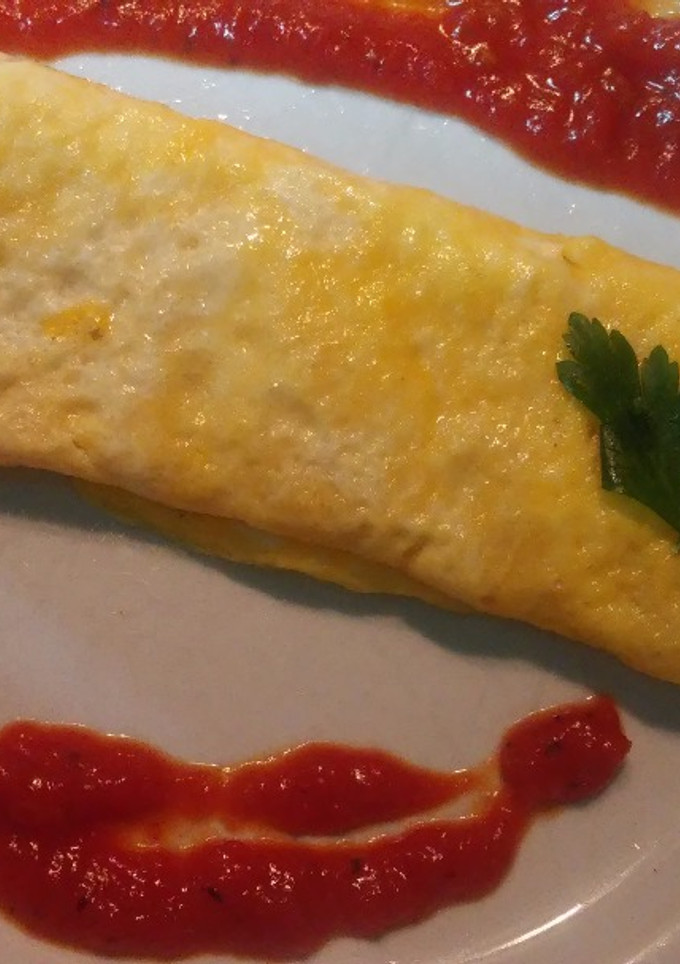 Una foto de Rulo de bacon y queso