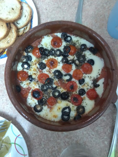 Una foto de Provolone al horno