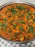 Chicken with Peanut Butter, Carrots, Tomatoes, and Spices