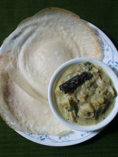 A picture of Appam with Vegetable Stew.