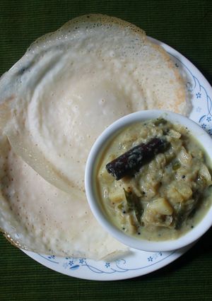 A picture of Appam with Vegetable Stew.