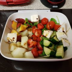 A picture of My Melon & Strawberry Salad with Raspberry Balsamic vinegar. 😙.