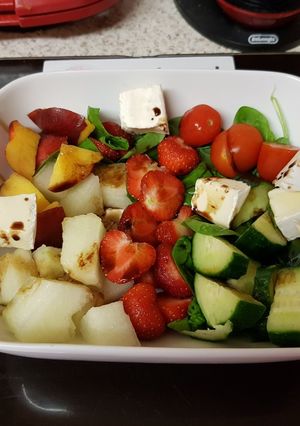 A picture of My Melon & Strawberry Salad with Raspberry Balsamic vinegar. 😙.