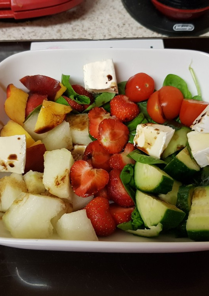 A picture of My Melon & Strawberry Salad with Raspberry Balsamic vinegar. 😙.
