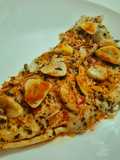 Pescado al horno con refrito de ajos