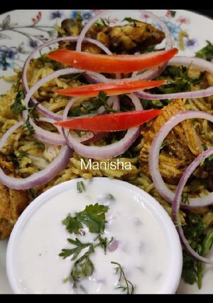 A picture of Chicken Biryani in Cooker.