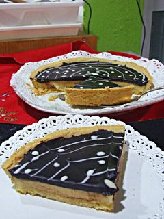 Hình của món Bánh Tart trứng phomai với ganache chocolate vị cam.