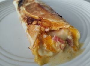 Una foto de Burrito🌯de🌮desayuno🍳🥓🧀