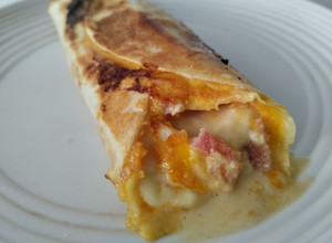 Una foto de Burrito🌯de🌮desayuno🍳🥓🧀