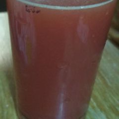 A picture of Orange and pomegranate juice.