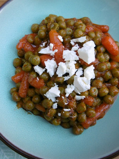 A picture of Veggie Stew with just Carrots & Peas in Tomato Sauce.