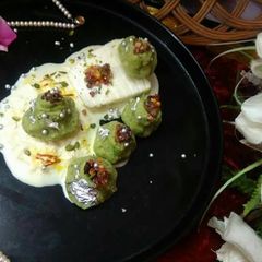 A picture of Paneer paan kalash in kesriya Rabdi.