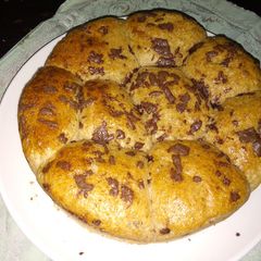 A picture of Brown Buns with chocolate shavings.