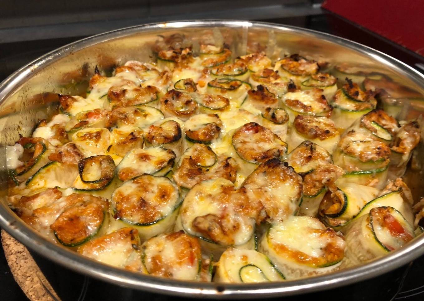 Spicy chicken in zucchini roll-ups