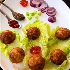 Sooji Veggies Appe A picture of Sooji Veggies Appe.