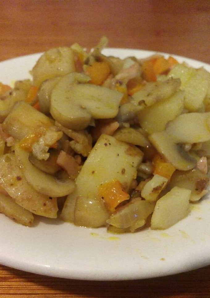 Una foto de Papas con Champiñones y Tocino