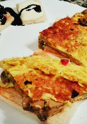 Una foto de Tostas de tortilla de champiñones al ajillo