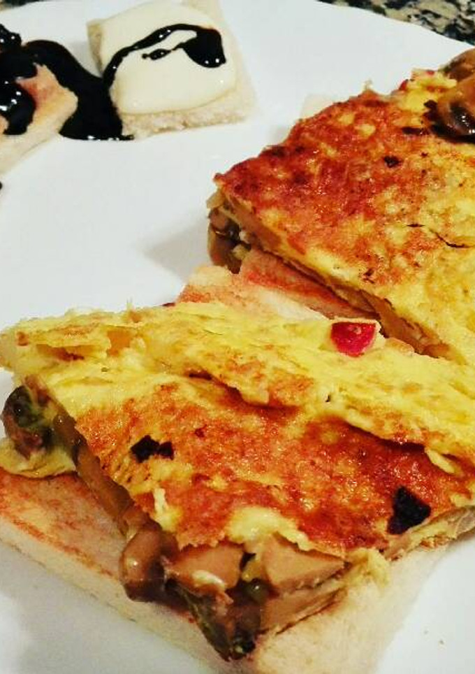 Una foto de Tostas de tortilla de champiñones al ajillo