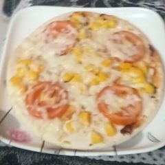 A picture of Cheese corn pizza.