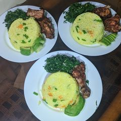 A picture of Vegetables rice, baked chicken and vegetables.