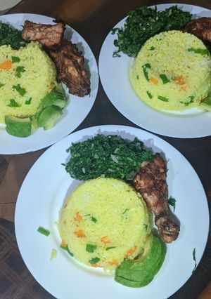 A picture of Vegetables rice, baked chicken and vegetables.