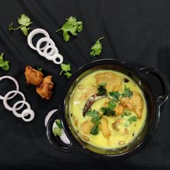 A picture of Punjabi pakoda kadhi.