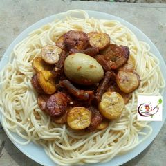 A picture of Spaghetti with sauce and dodo.