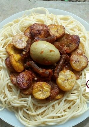 A picture of Spaghetti with sauce and dodo.