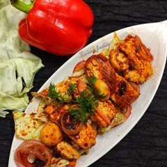 A picture of Peri peri paneer mushroom.
