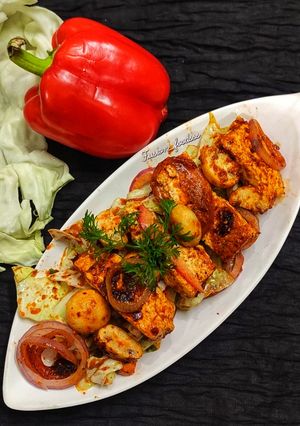 A picture of Peri peri paneer mushroom.