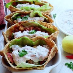 A picture of Pita Bread Chick Pea Kidney bean filling with Tzatziki sauce.