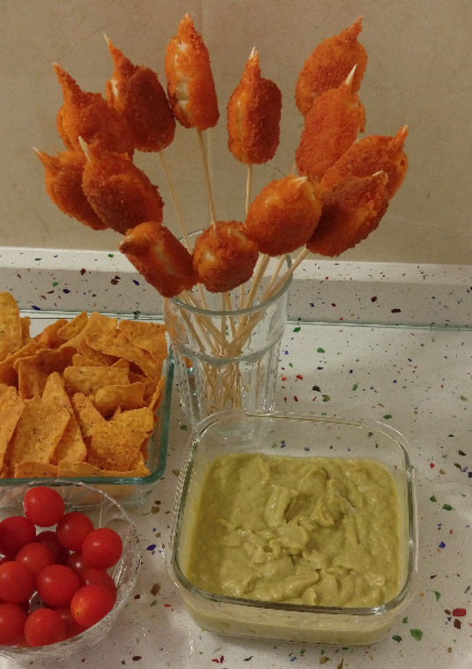 Una foto de Muslitos de mar con guacamole