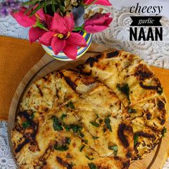 A picture of Cheesy garlic naan.