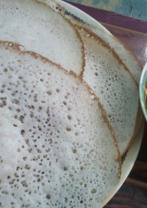 A picture of Appam and veg kurma.