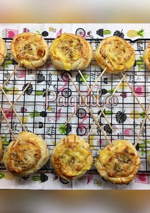 Foto principal de Piruletas 🍭 de hojaldre (de lomo🐷y queso 🧀)