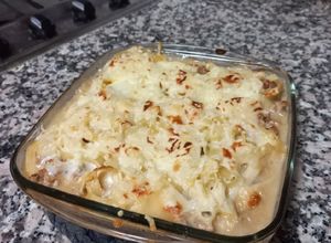 Foto de Massa à bolonhesa com molho bechamel e queijo ralado