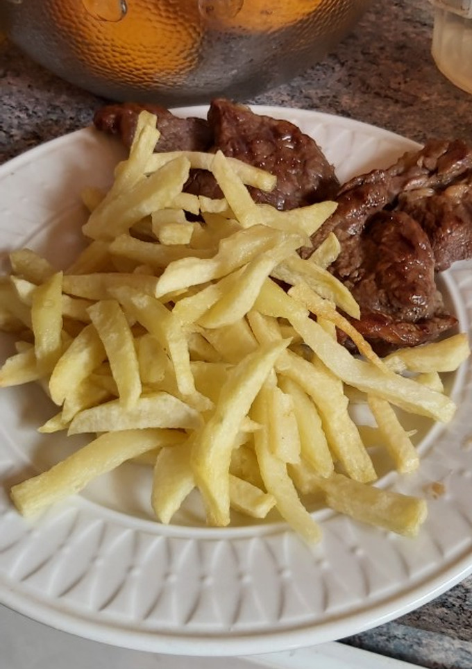 Una foto de Bistec con Papas fritas