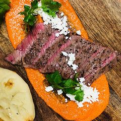 Miyazakigyu Wagyu Strip Steak with Romesco Sauce A picture of Miyazakigyu Wagyu Strip Steak with Romesco Sauce.
