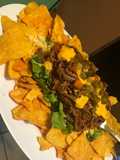 Carne desmechada en su jugo para nachos o tacos