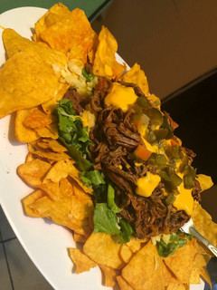 Una foto de Carne desmechada en su jugo para nachos o tacos