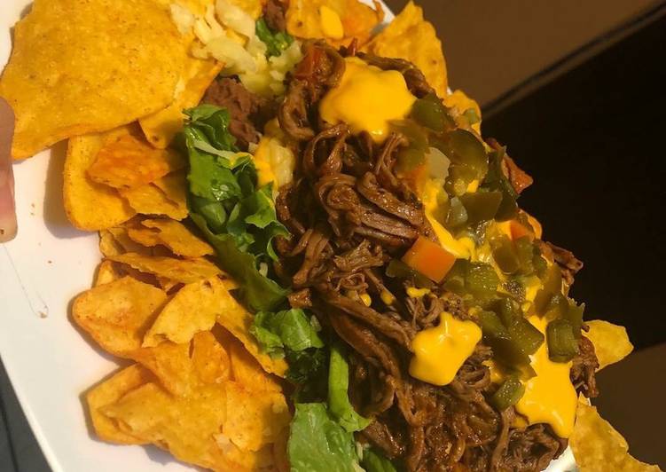 Carne desmechada en su jugo para nachos o tacos