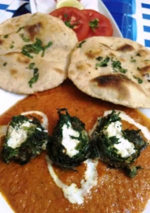 A picture of Palak Paneer Kofta with Tandoori Roti.