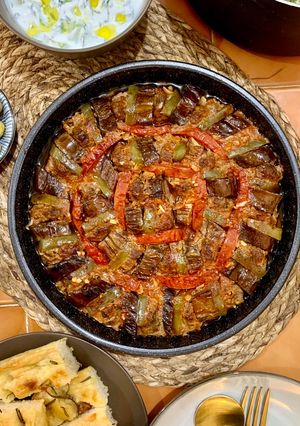 A picture of Firinda Patlican Kebabi (Baked Aubergines with Lamb Meatballs Kebab).