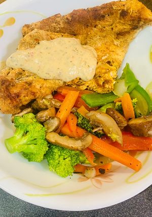 A picture of Grilled Chicken Breast with Sautéed Veggies.