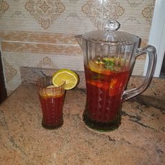 A picture of Chapman garnished with cocumber & orange.