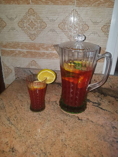 A picture of Chapman garnished with cocumber & orange.