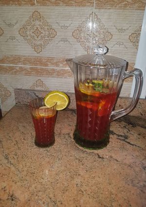 A picture of Chapman garnished with cocumber & orange.