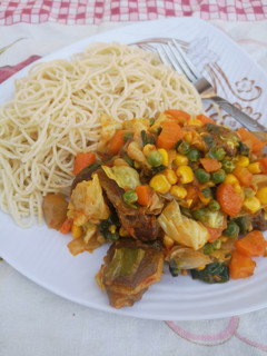 A picture of Spaghetti with veggies sauce.